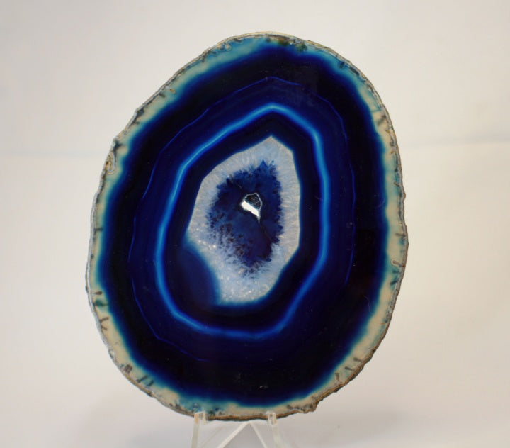 Agate slab showing blue banding and crystal bands
