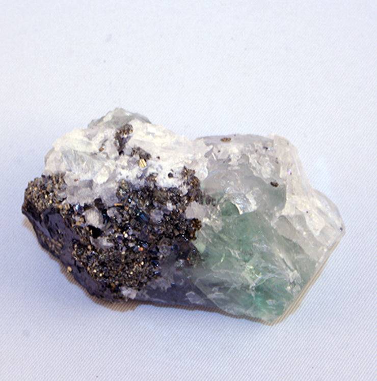 10123_fluorite on pyrite - side view
