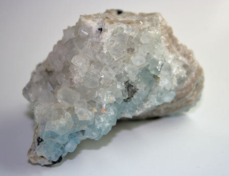 10088-back view of clear and blue fluorite crystals