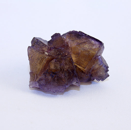 Fluorite complex crystal cluster - front - showing purple layer