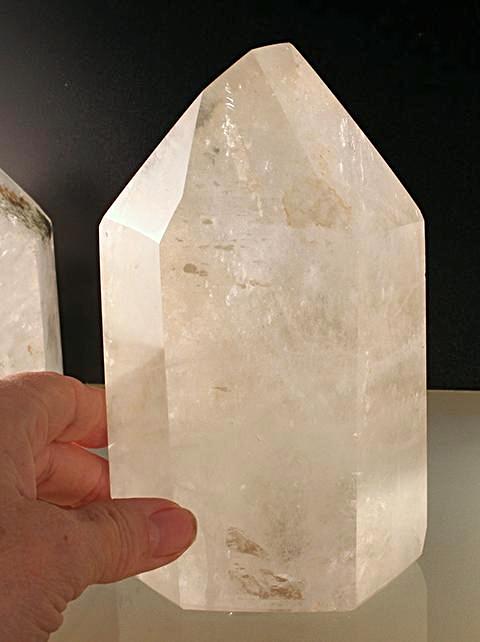 tall quartz pillar_with hand